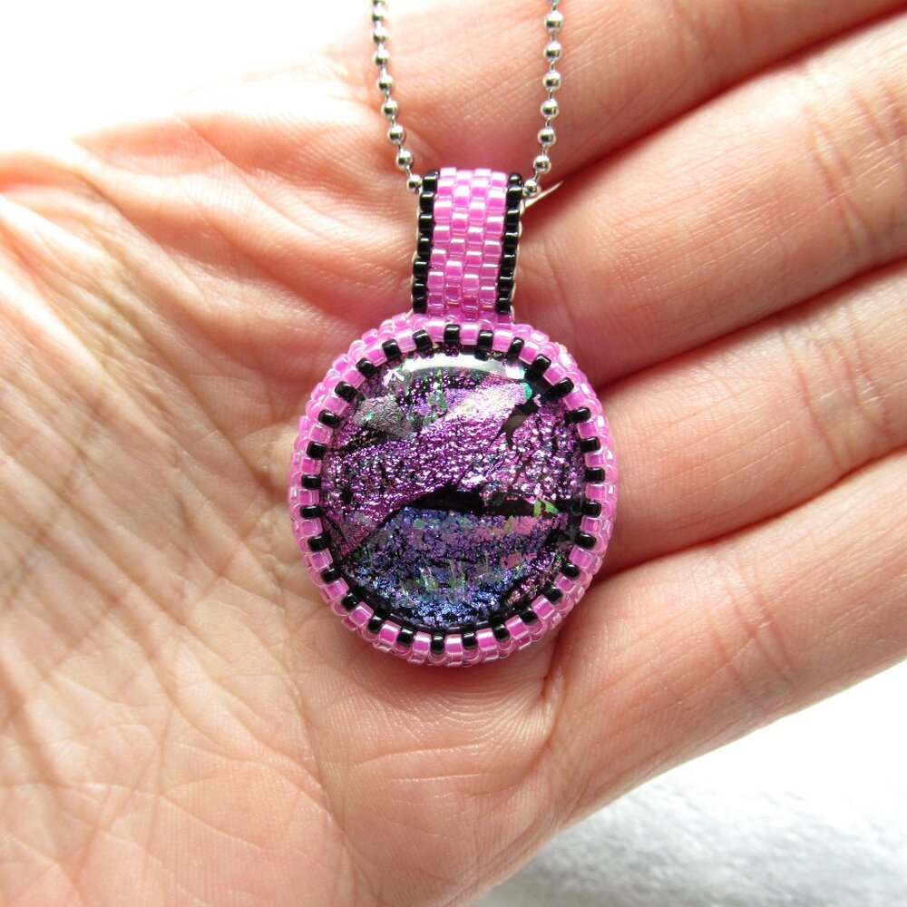 Pink fused glass handwoven pendant